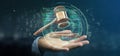 Businessman holding a Justice hammer and data - 3d rendering
