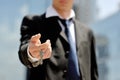 Businessman holding a key in his hand Royalty Free Stock Photo