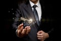 Businessman holding the key to success Royalty Free Stock Photo