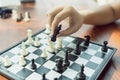 Businessman holding a King Chess is placed on a chessboard.using as background business concept and Strategy concept with copy Royalty Free Stock Photo