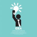 Businessman Holding A Light Bulb Idea Concept