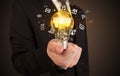 Businessman holding a light bulb, social media concept Royalty Free Stock Photo