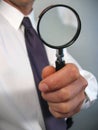 Businessman Holding Magnifying Glass Royalty Free Stock Photo