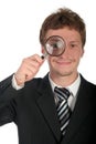 Businessman Holding Magnifying Glass Royalty Free Stock Photo