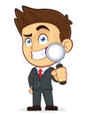 Businessman Holding a Magnifying Glass Royalty Free Stock Photo