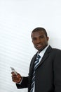 Businessman holding mobile phone Royalty Free Stock Photo