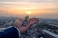 Businessman holding a navigation compass in hand and define marketing direction, Abstract business