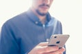 Businessman holding the new Apple iPhone 6s retina Royalty Free Stock Photo