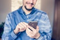 Businessman holding the new Apple iPhone 6s retina Royalty Free Stock Photo