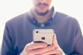 Businessman holding the new Apple iPhone 6s retina Royalty Free Stock Photo