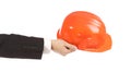 Businessman holding an orange engineer helmet