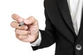 Businessman holding pen in writing position to screen, selective focus, isolated on white background Royalty Free Stock Photo