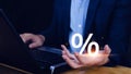 Businessman holding with percentage sign, monetary growth, interest rate increase, inflation concept, Interest rate financial