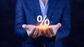 Businessman holding with percentage sign, monetary growth, interest rate increase, inflation concept, Interest rate financial