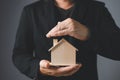 the businessman holding a piggy bank, donation, charity, fundraising, superannuation, investment, saving, family finance plan