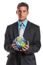 Businessman holding planet earth