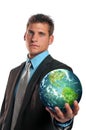 Businessman holding planet earth