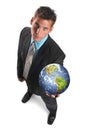 Businessman holding planet earth