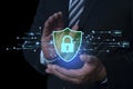 Businessman holding protection data shield icon, Protection network security computer in the hands. Shield Internet protected from Royalty Free Stock Photo