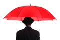 Businessman holding a red umbrella Royalty Free Stock Photo