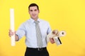 Businessman holding a roller