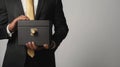 The businessman holding secure box.AI generated image Royalty Free Stock Photo