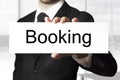 Businessman holding sign booking Royalty Free Stock Photo