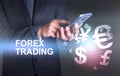 Businessman holding smart phone world of currency forex trading Royalty Free Stock Photo