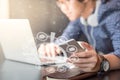 Businessman holding smartphone with glowing hologram Royalty Free Stock Photo