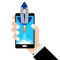 Businessman holding a smartphone with a rocket.Concept of Start up. Royalty Free Stock Photo