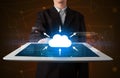 Businessman holding tablet with cloud icon Royalty Free Stock Photo