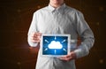 Businessman holding tablet with cloud icon Royalty Free Stock Photo