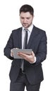 Businessman holding tablet