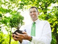Businessman Holding Tree Plant Forest Concept Royalty Free Stock Photo