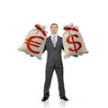 Businessman holding two money bags Royalty Free Stock Photo