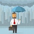 Businessman holding an umbrella Royalty Free Stock Photo