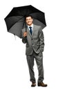 Businessman holding umbrella Royalty Free Stock Photo