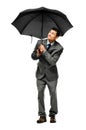 Businessman holding umbrella Royalty Free Stock Photo