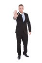 Businessman holding up his hand in a stop gesture