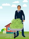 Businessman holding a wheelbarrow full of greenbacks or money bundles on real estate background.