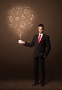 Businessman holding a white cup with social media icons Royalty Free Stock Photo