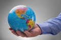 Businessman holding the world in his hands Royalty Free Stock Photo