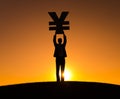 Businessman Holding Yen Currency on the Hill Royalty Free Stock Photo