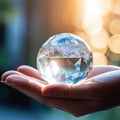 Businessman holds crystal globe in hands,Crystal Earth On green grass Environment concept, Glass globe in the grass,AI generated