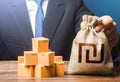 Businessman holds israeli shekel money bag and boxes with goods. Import and export. Business income. Payment of taxes and fees.