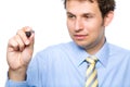 Businessman holds marker, drawing in air, isolated