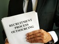 Man holds Recruitment Process Outsourcing RPO Royalty Free Stock Photo
