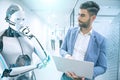 Businessman and humanoid robot solving problems