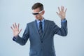Businessman imagining while using virtual reality glasses