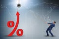 The businessman increasing interest rate in market